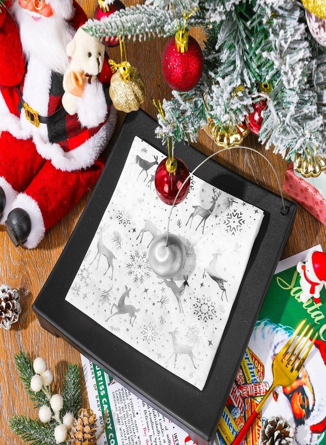 JarThenaAMCS مناديل ورقية من JarThenaAMCS، ٥٠ قطعة، للاستخدام مرة واحدة، مصنوعة من رقائق معدنية فضية اللون، مزينة برسومات ندفة الثلج والغزلان، مثالية للغداء والعشاء وحفلات أعياد الميلاد. - Image 4